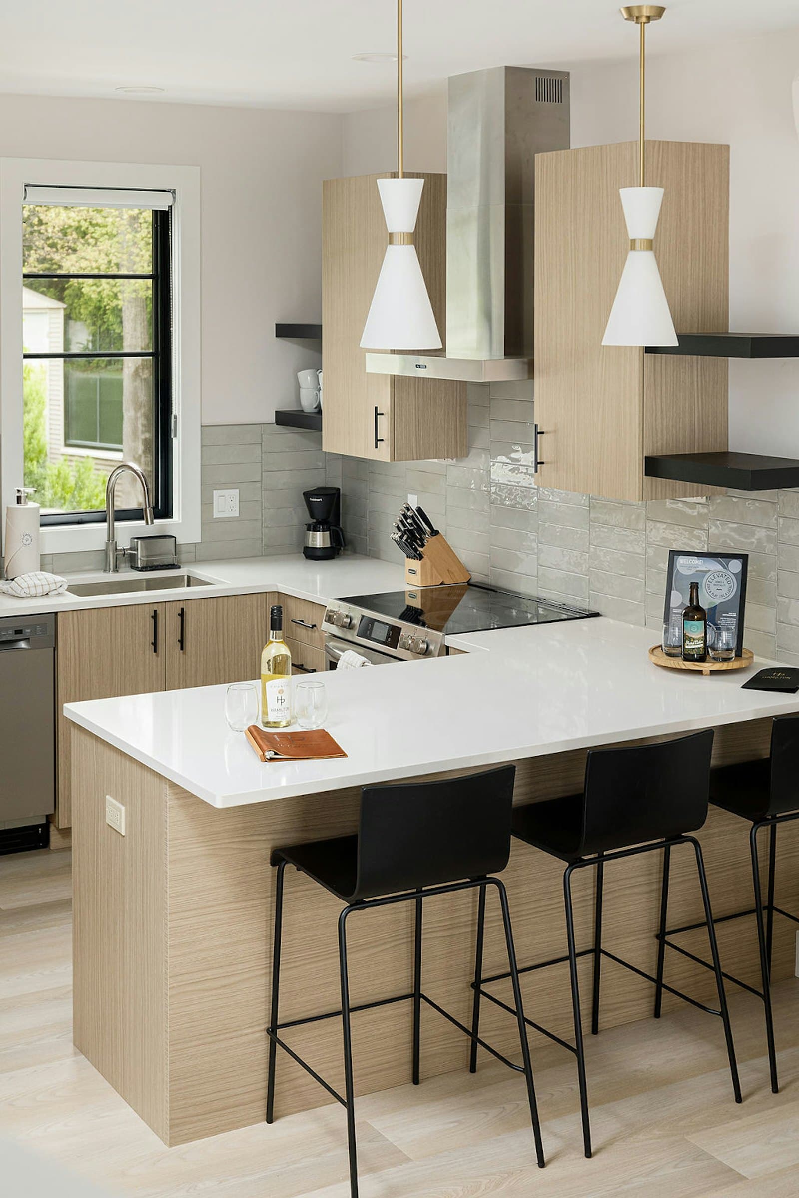 Kitchen island with bar stools and range