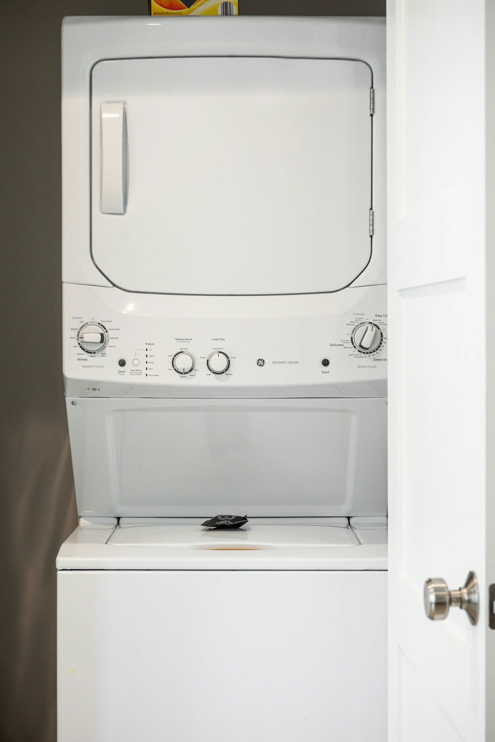 In-unit stacked washer and dryer
