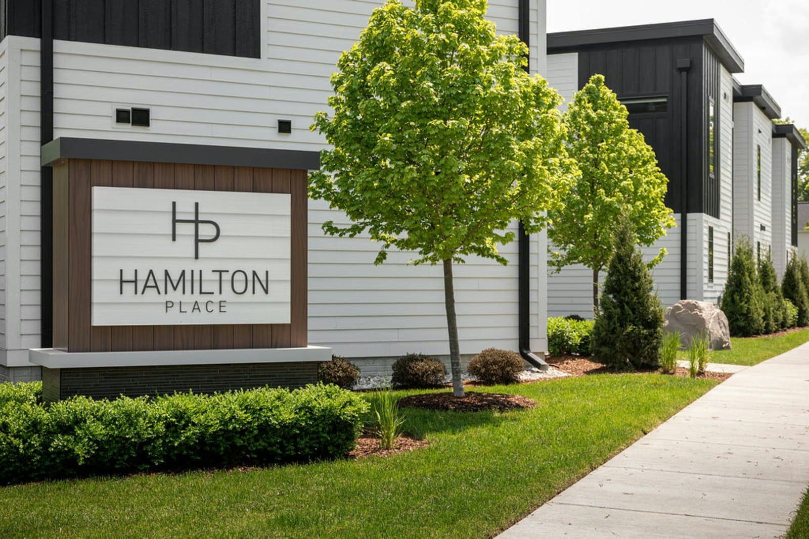 Hamilton Place monument sign and townhomes